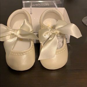 Ivory baby shoes never been worn